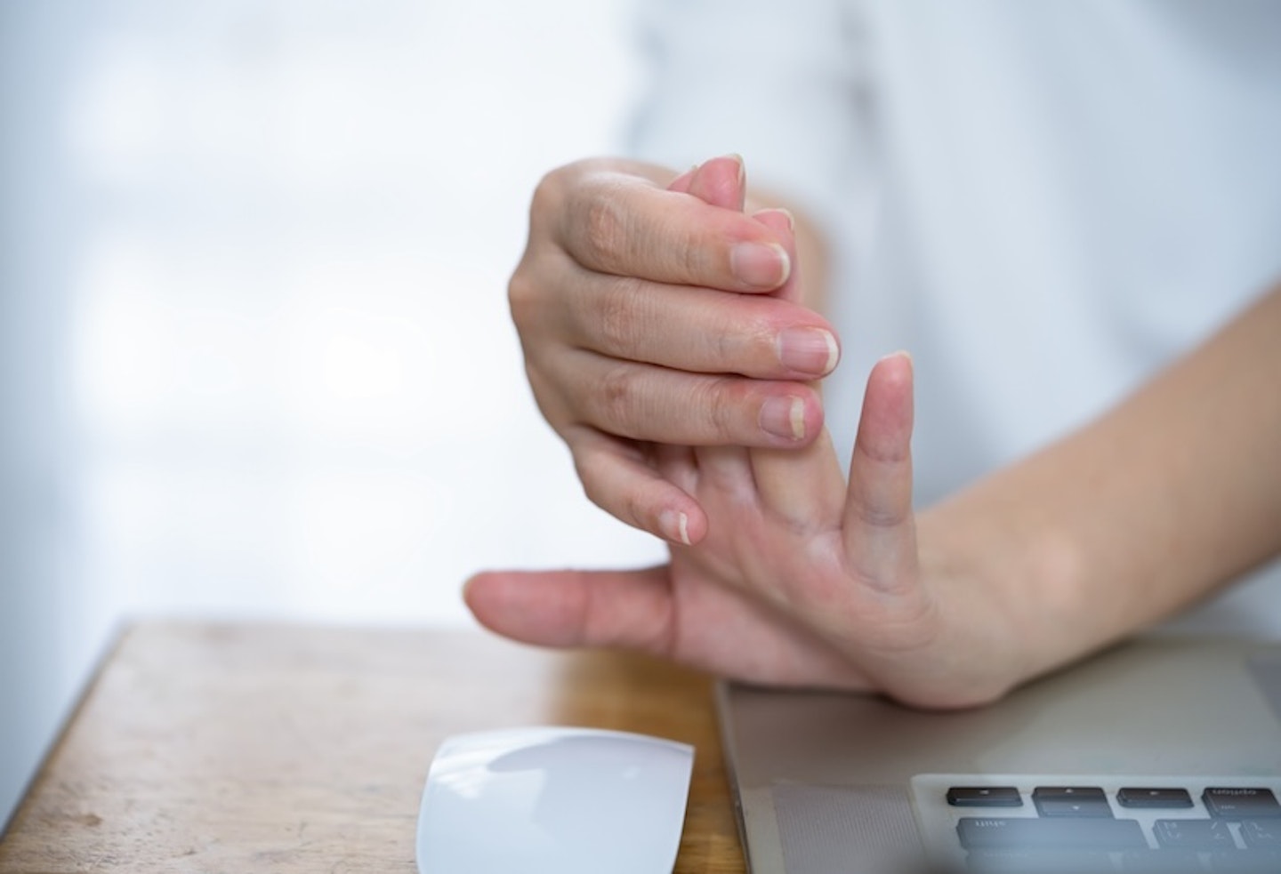 Bending a hand backwards to help with carpal tunnel syndrome