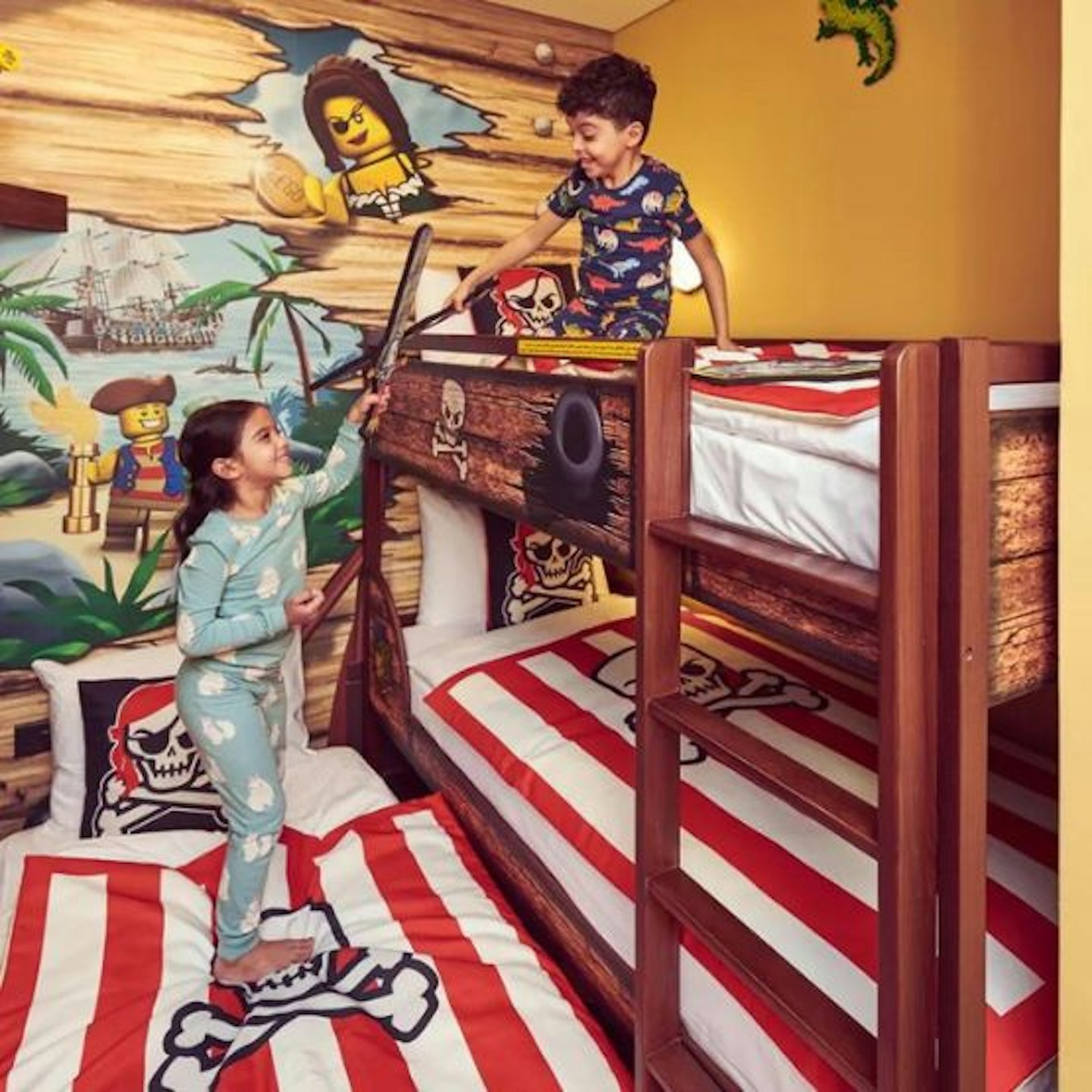 Children playing in a pirate themed hotel room in Legoland Dubai