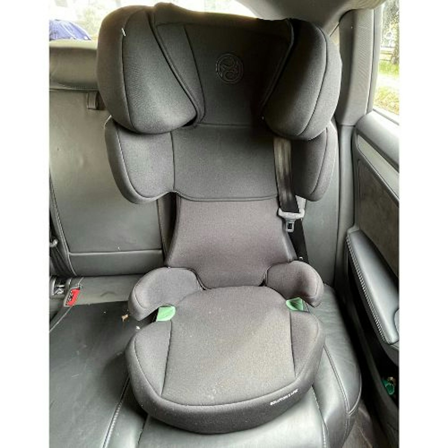 Cybex Silver Solution X-Fix Child's Car Seat fitted to the back seat of a car