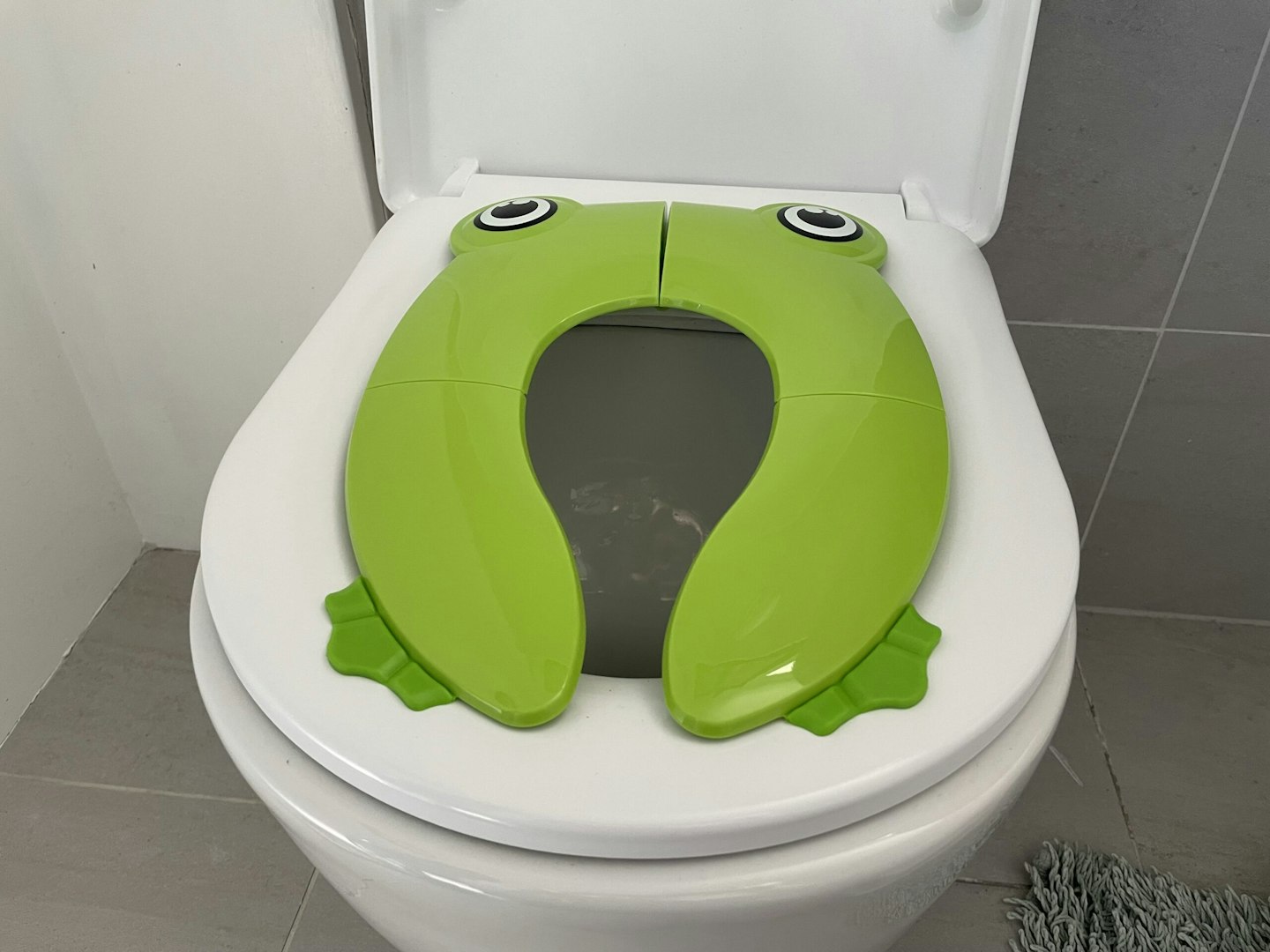 Pejoye Foldable Potty Toilet place on top of a toilet seat