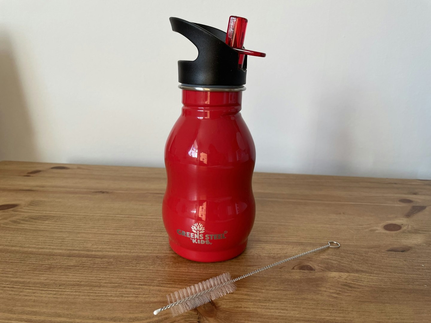 Greens steel water bottle red