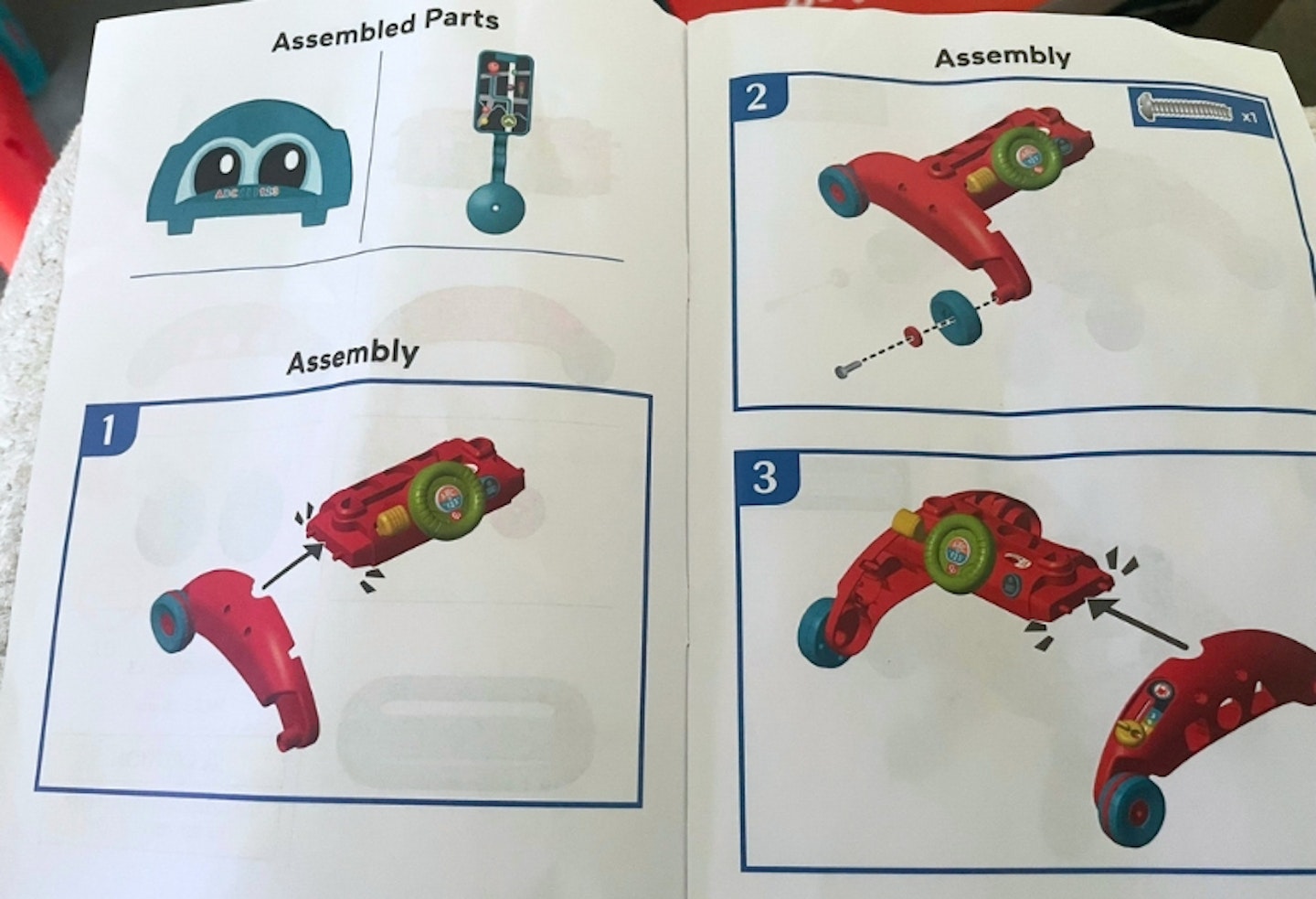 assembly instructions for the Fisher-Price 2-sided steady speed walker