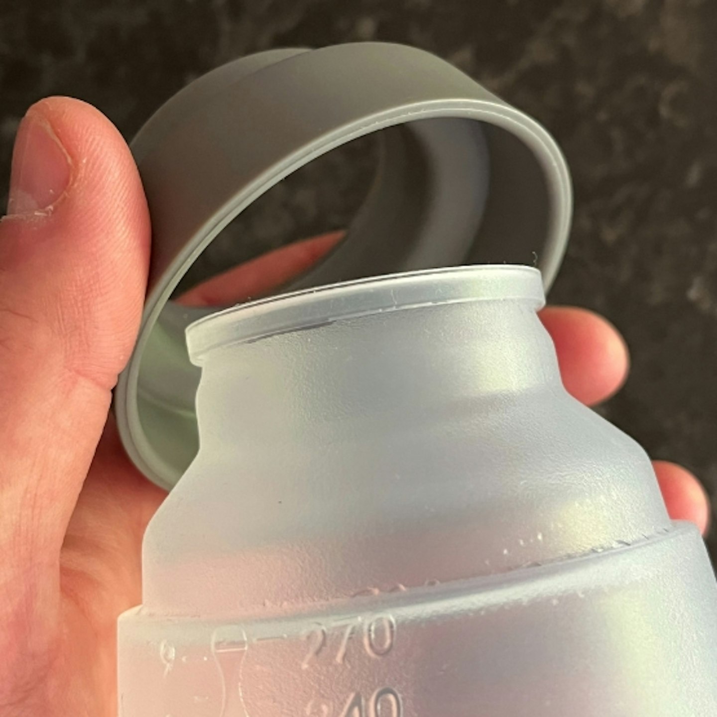 focus on the lid of the Nanobebe Flexy Silicone Baby Bottles