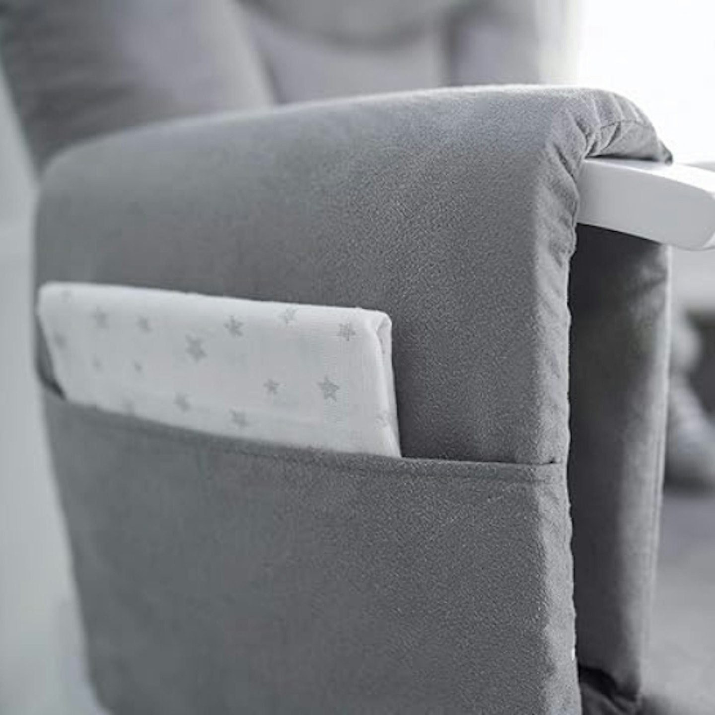 pocket feature on the Obaby Reclining Glider Nursing Chair