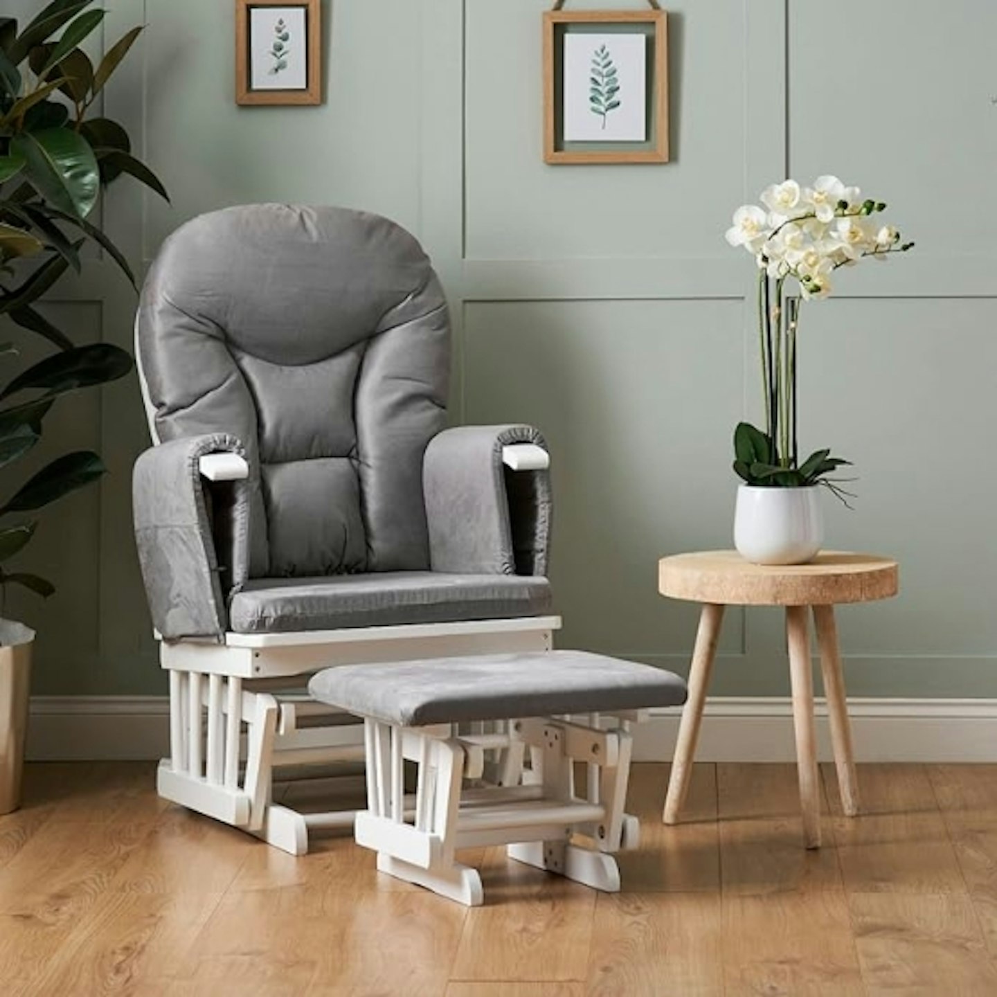 Obaby Reclining Glider Nursing Chair and stool in a home