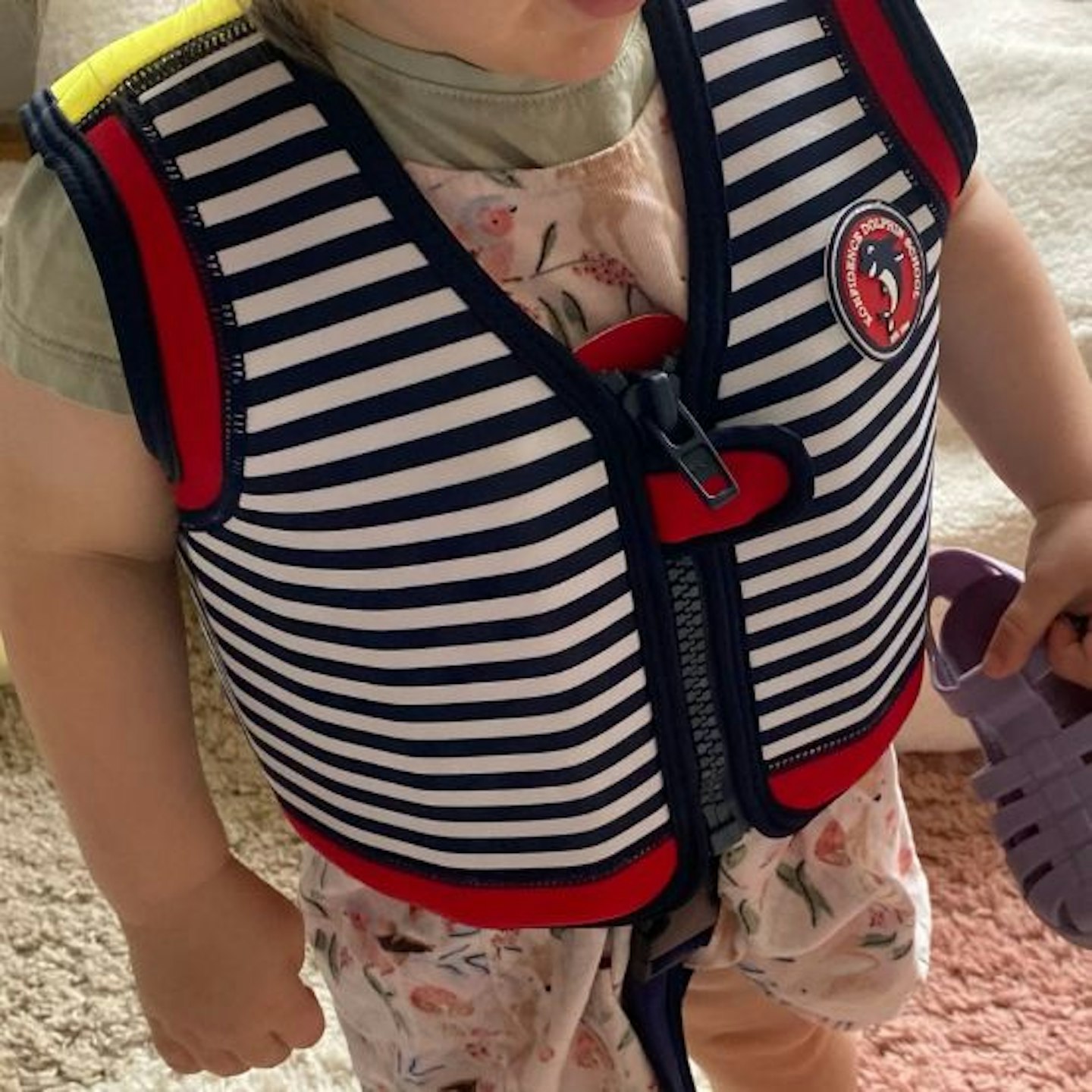 Young child wearing the Konfidence Premium Swim Jacket