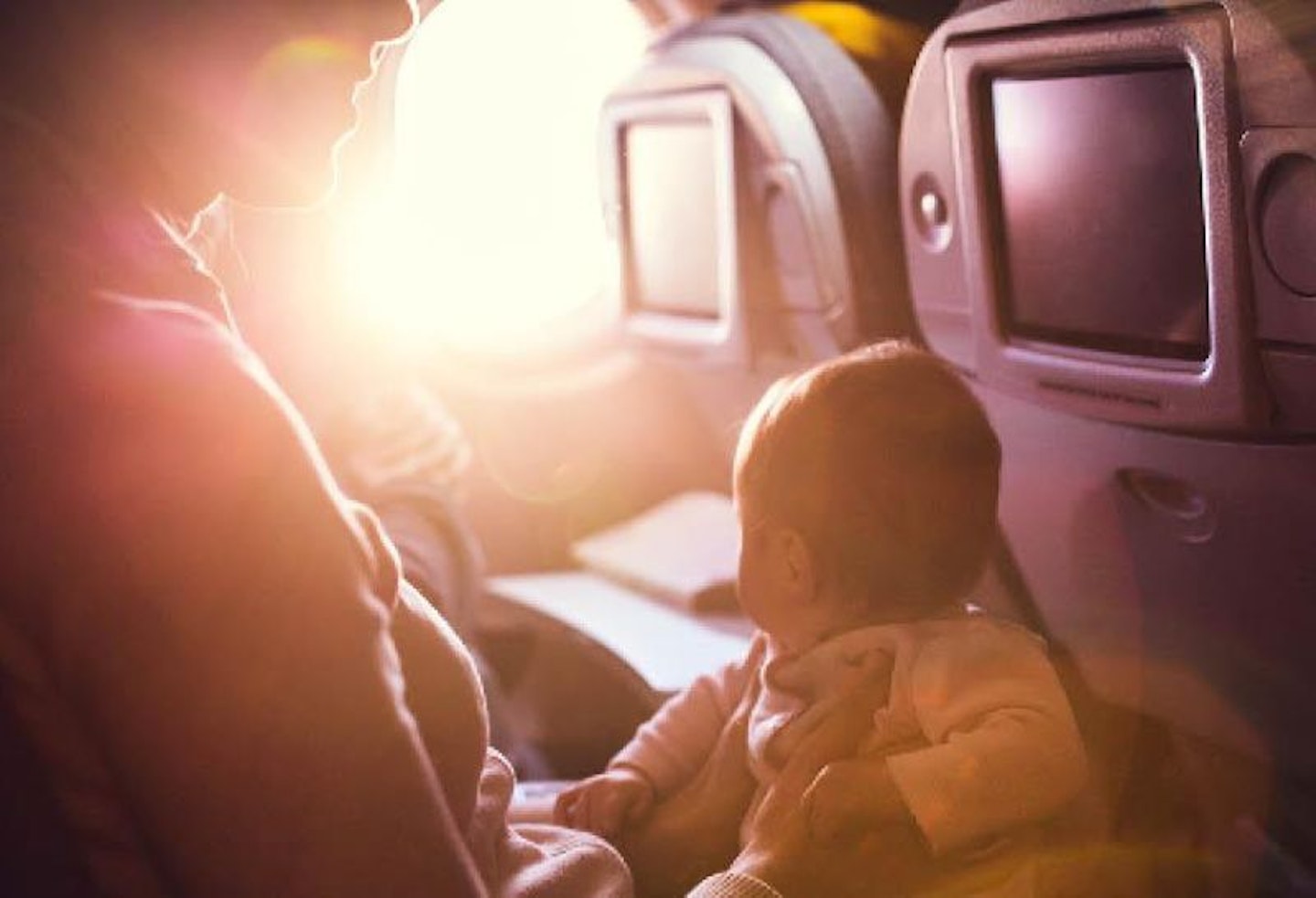 Mother and baby on Qatar Airways