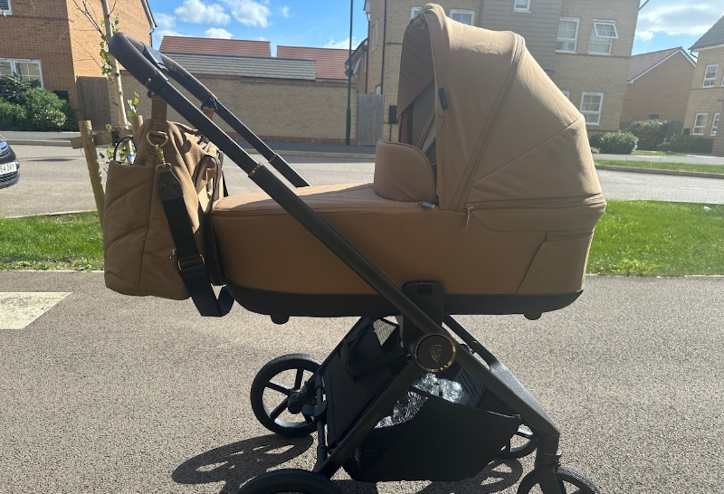 side photo of the Venicci Claro 3-in-1 plus travel system