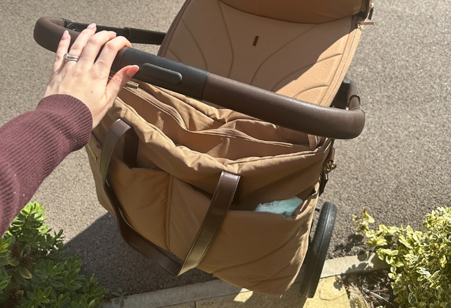 handle and attachable bag on the Venicci Claro 3-in-1 plus travel system