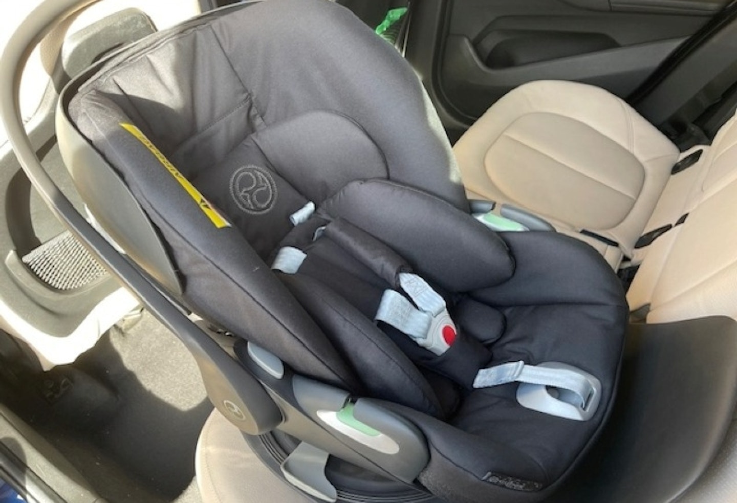 Close up of the CYBEX Cloud T i-Size Rotating Baby Car Seat fitted into the back of the car seat