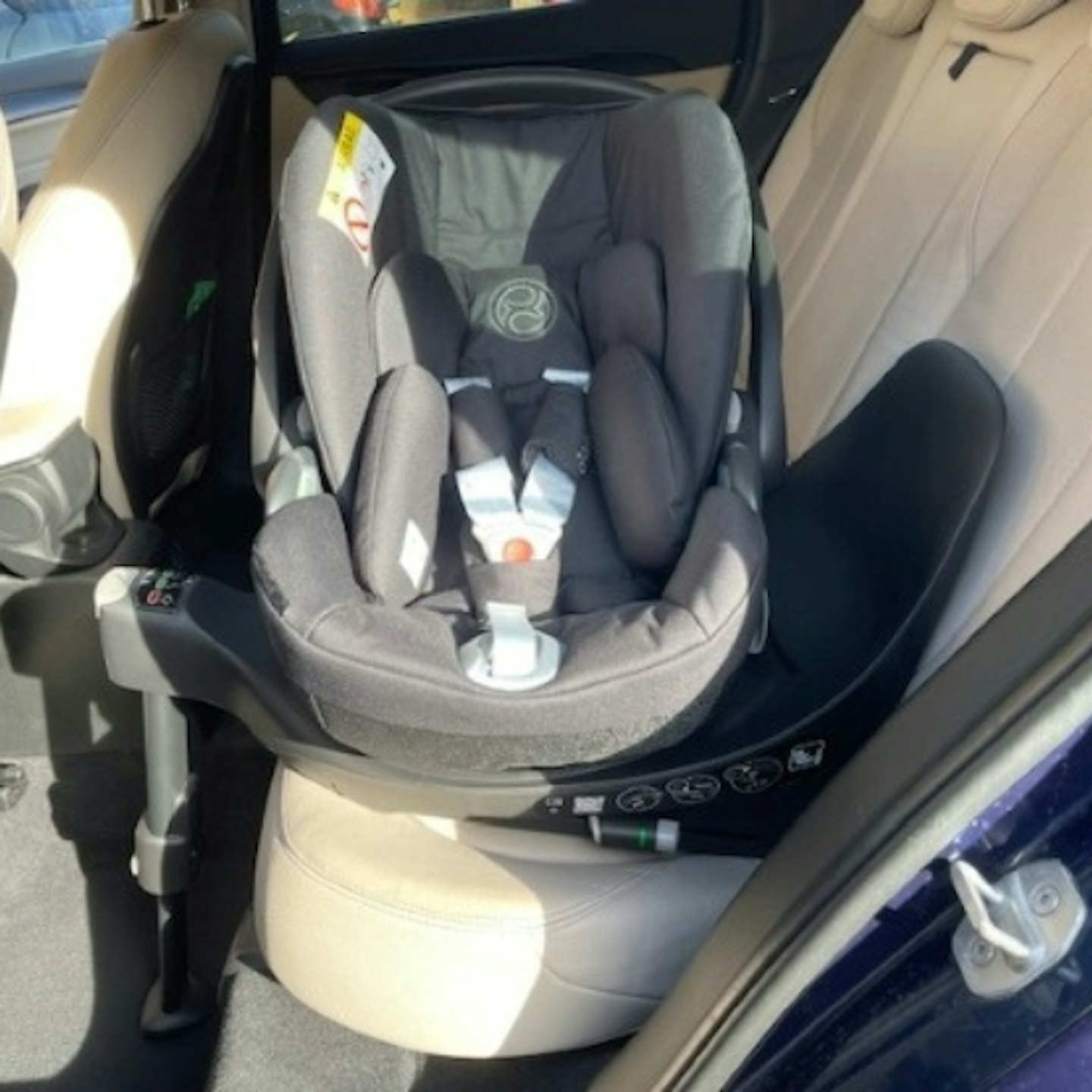 CYBEX Cloud T i-Size Rotating Baby Car Seat rotated on base to face passenger door