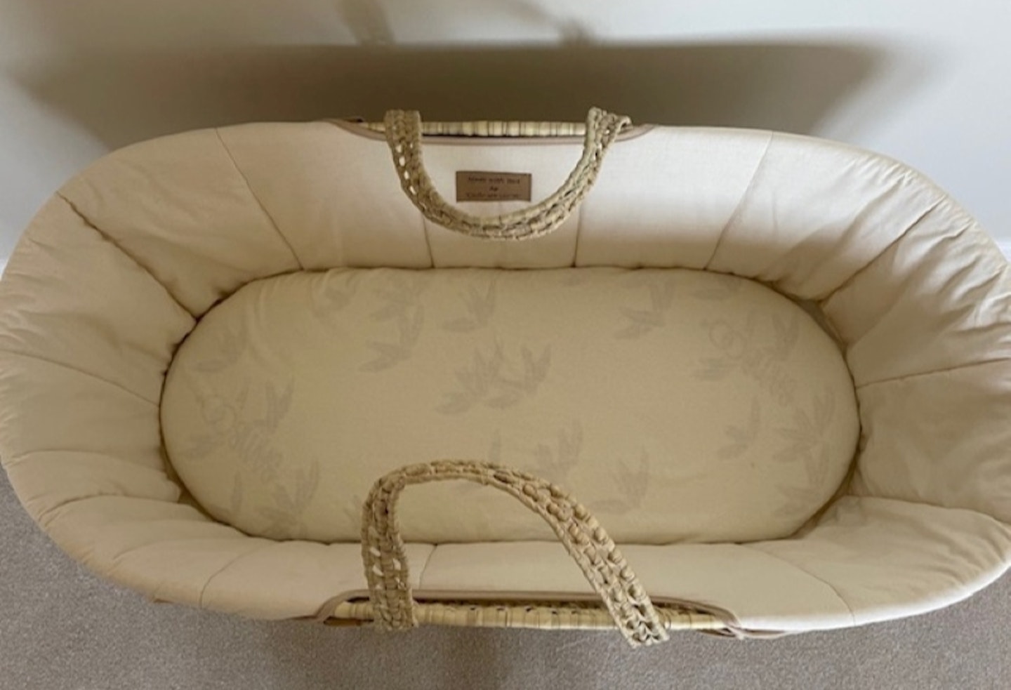 Top view of the Clair de Lune Organic Palm Moses Basket with mattress inside