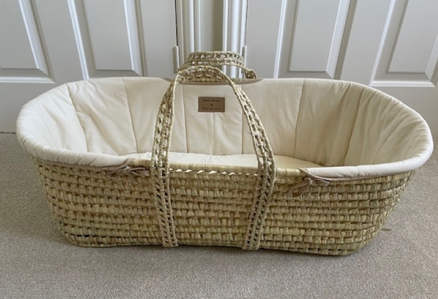 Clair de Lune Organic Palm Moses Basket place on floor