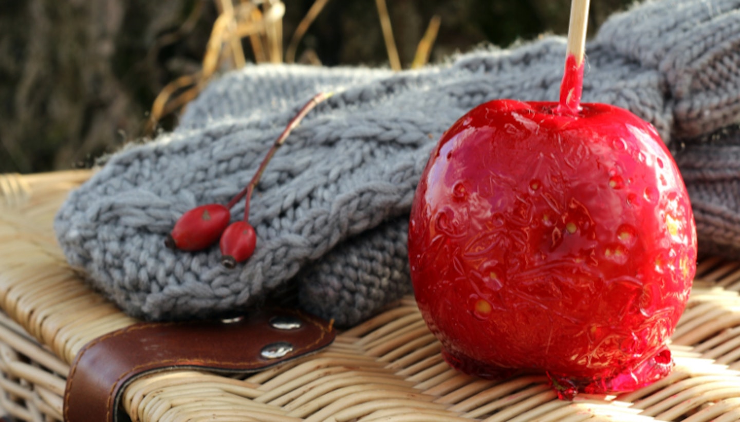 Sticky candy apple and wooly mittens