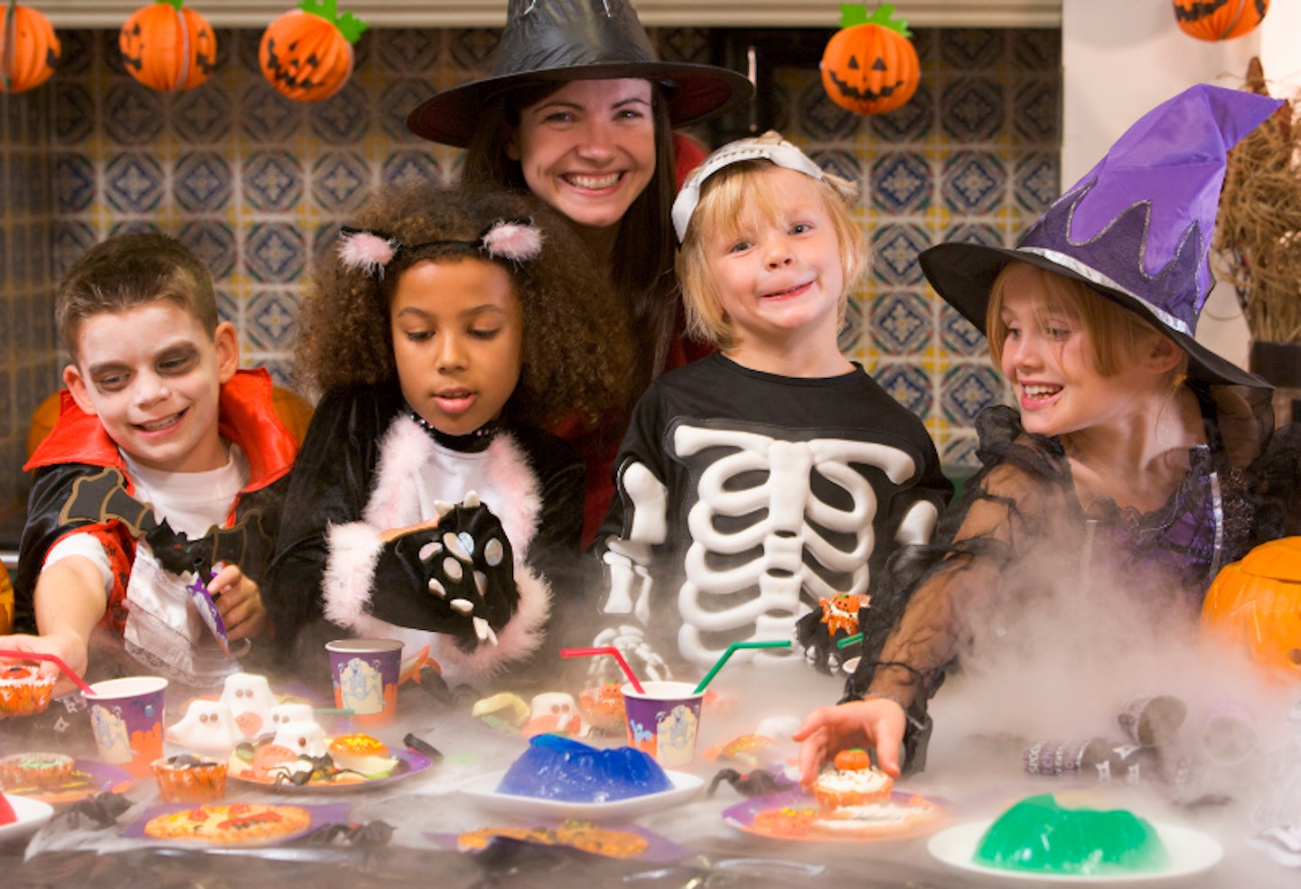 mum and kids at a Halloween party