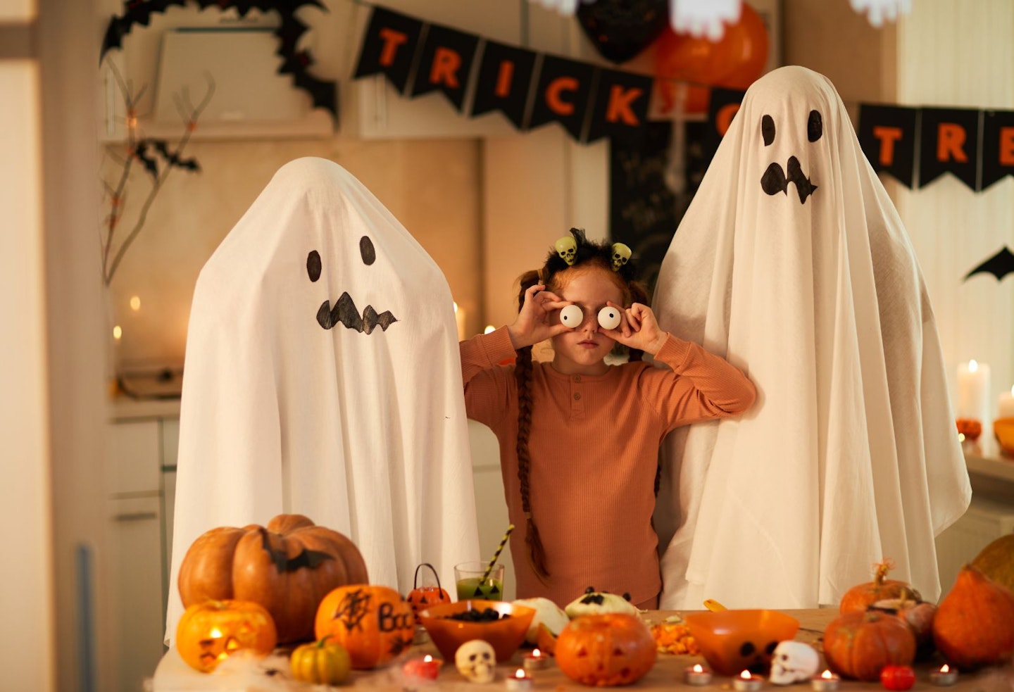 Girl with Ghosts at Halloween Party