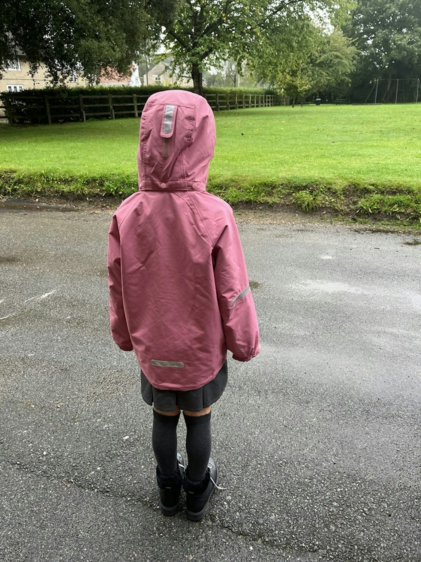 The back of a child testing the PO.P Waterproof School Coat