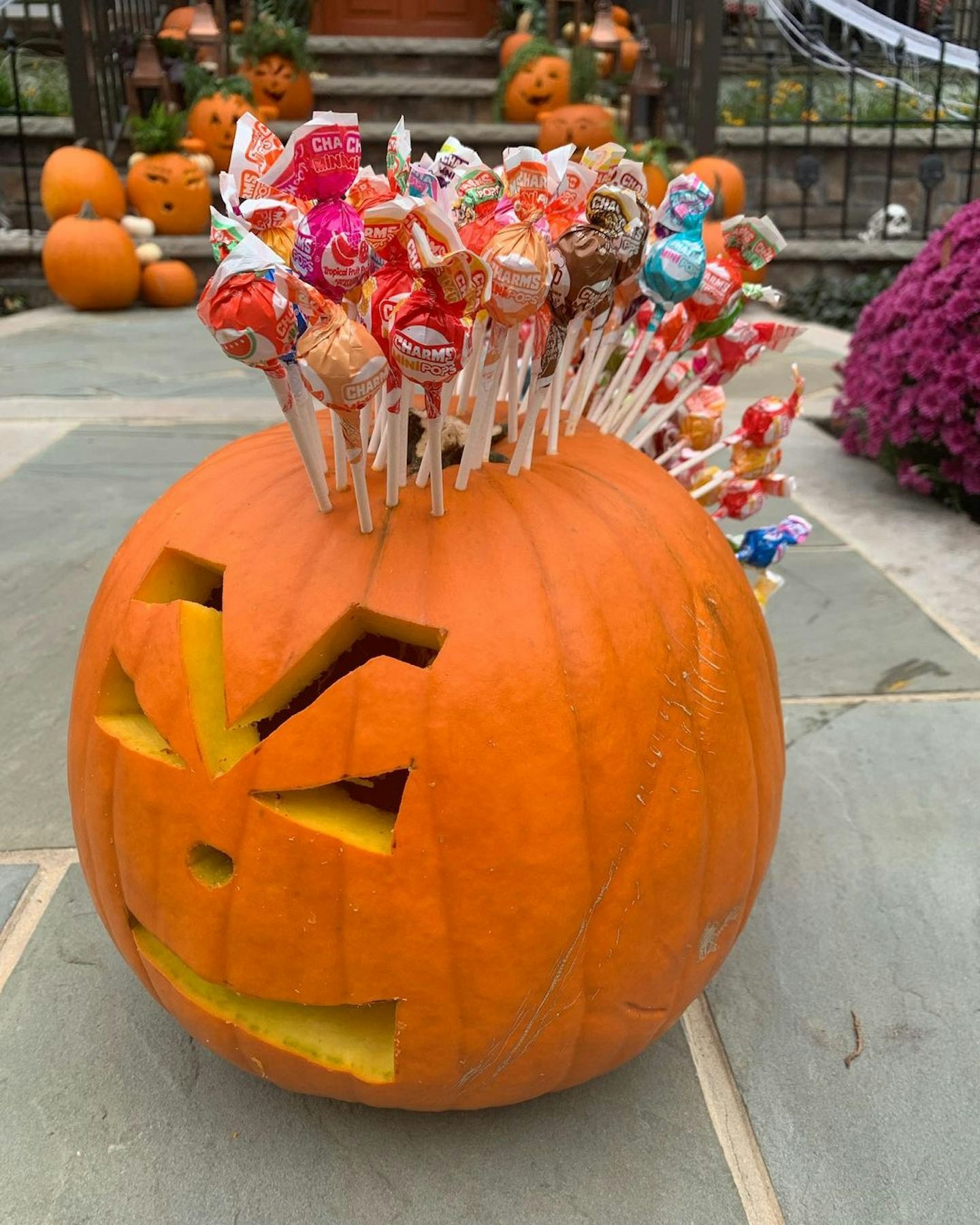 Carved pumpkin design with a lollipop mohawk