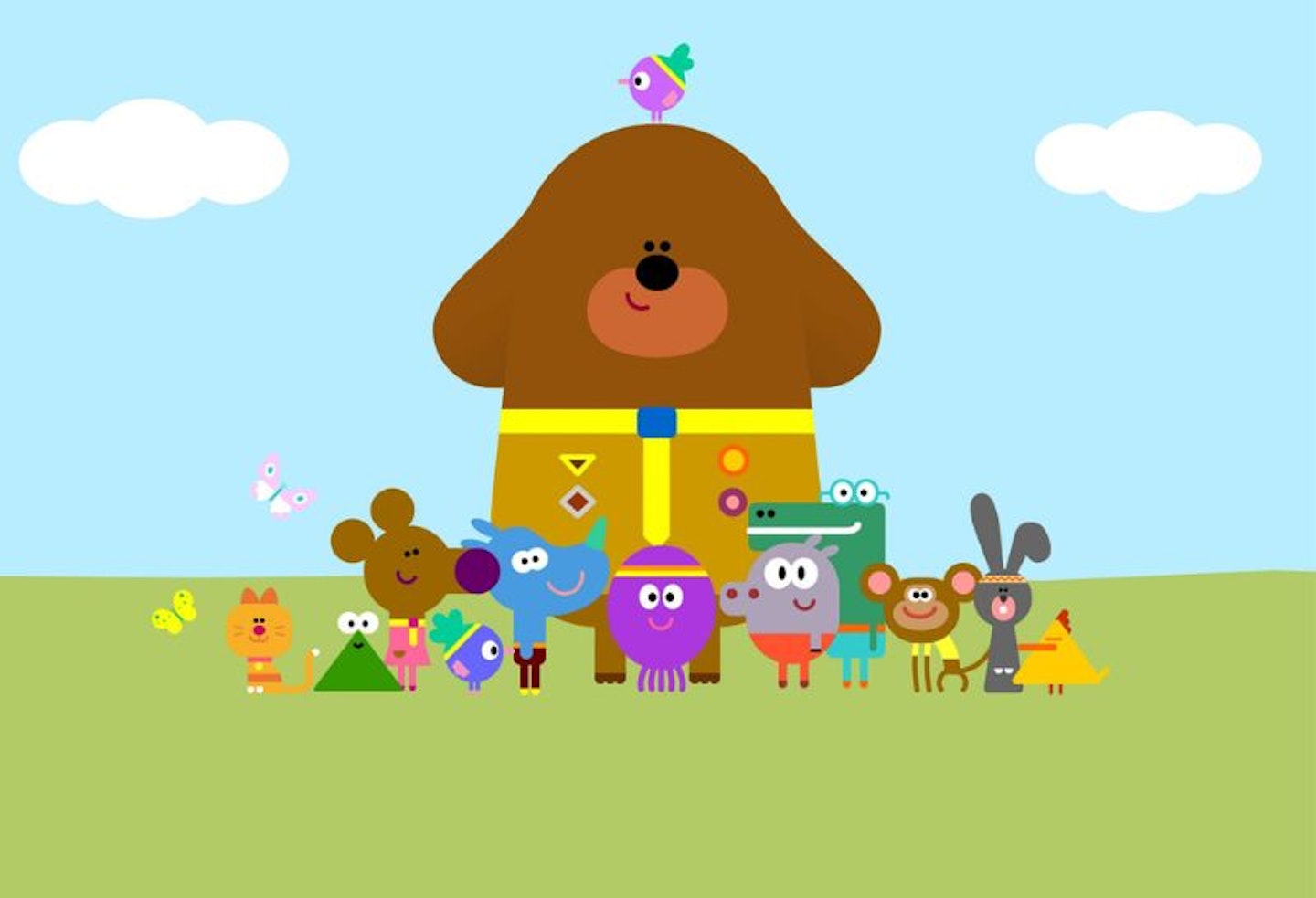 Duggee and the squirrels standing on grass in Hey Duggee