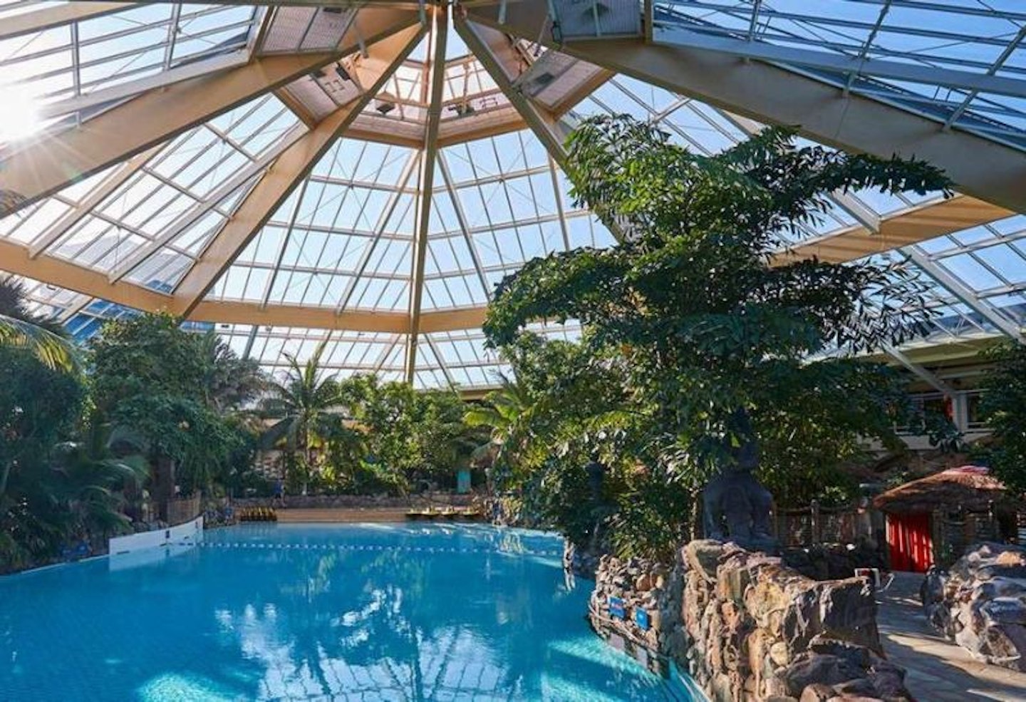 The Subtropical Swimming Paradise at Center Parcs showing the pool and a roof with the sky showing