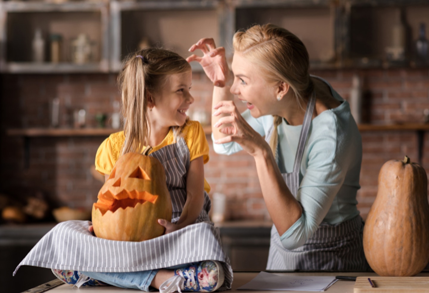 mum and daughter playing Halloween tricks