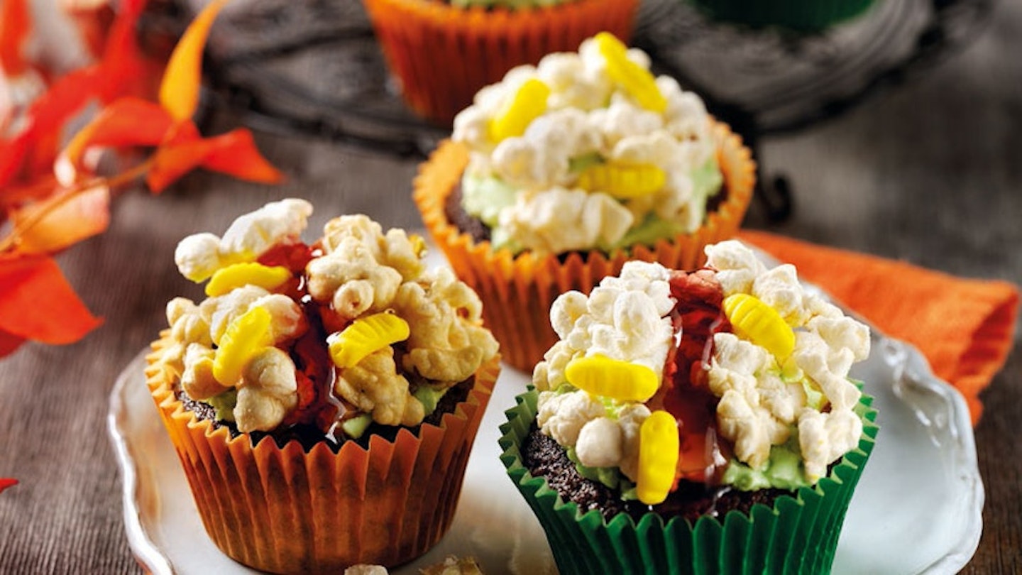 Halloween-themed cupcakes - popcorn brains with maggots