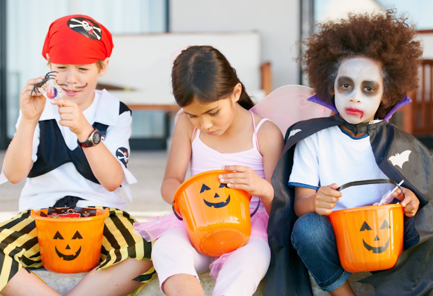 Children with Halloween sweets