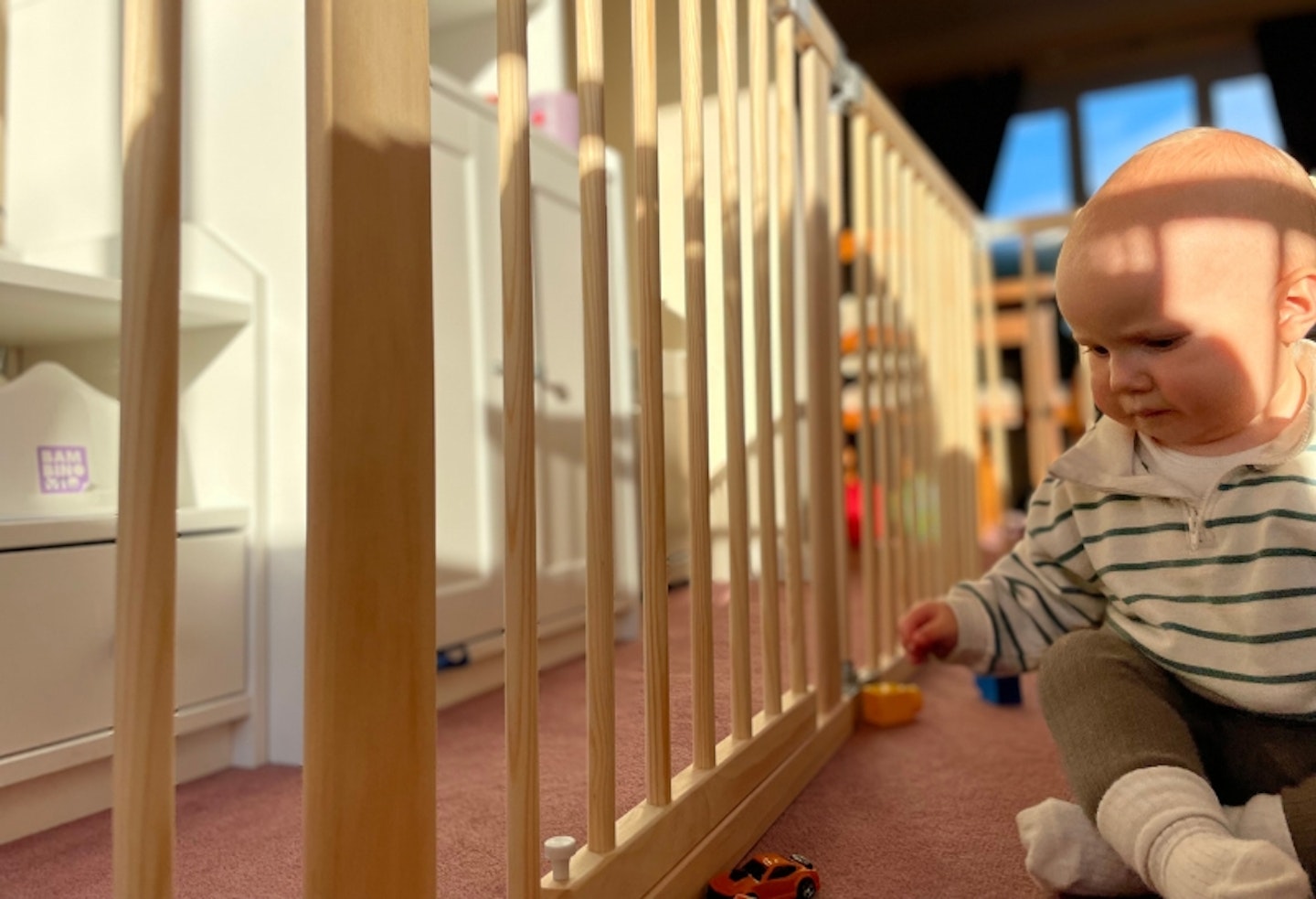 young child playing in the Baby Vivo Baby Playpen