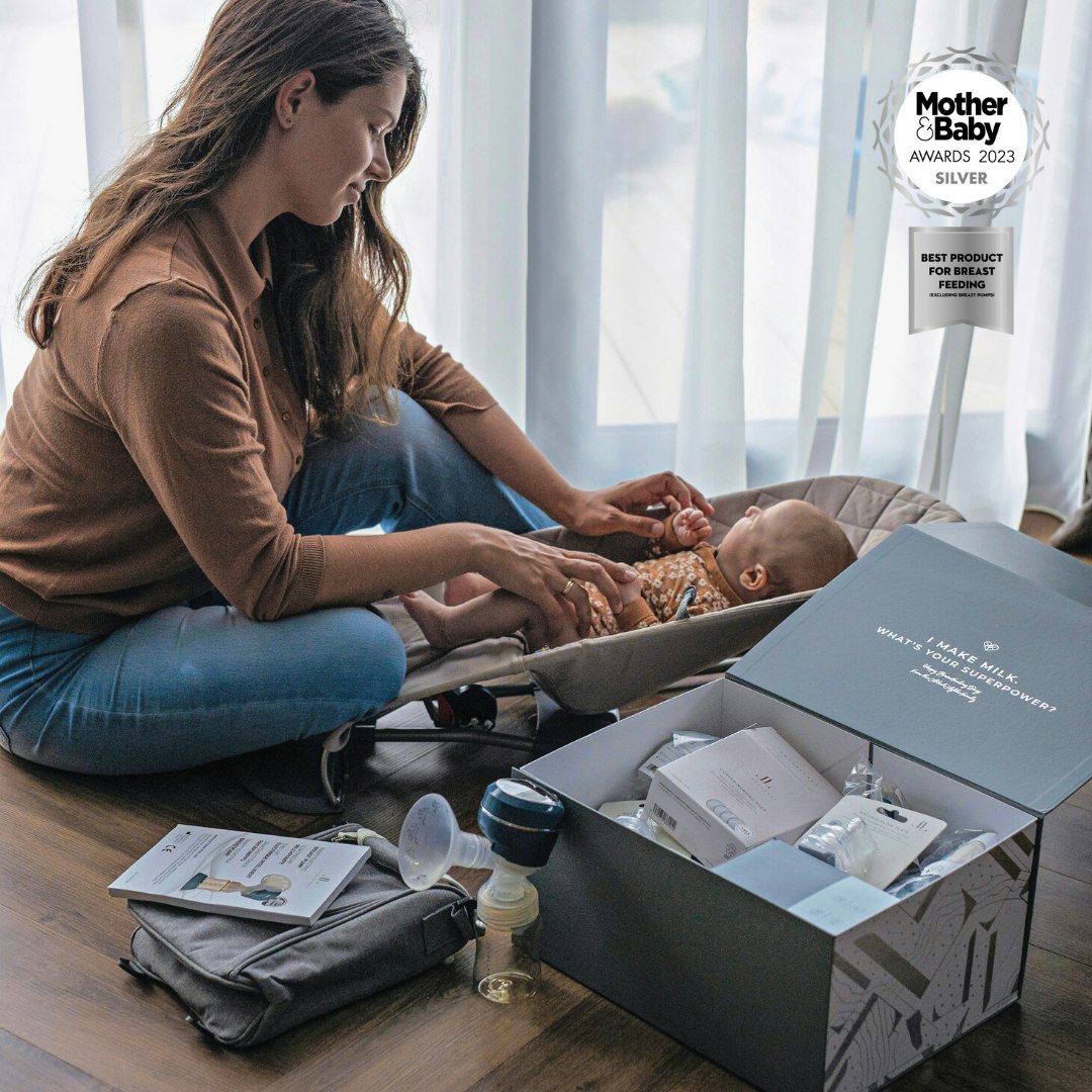 Mum and baby with Lola & Lykke breastfeeding starter kit