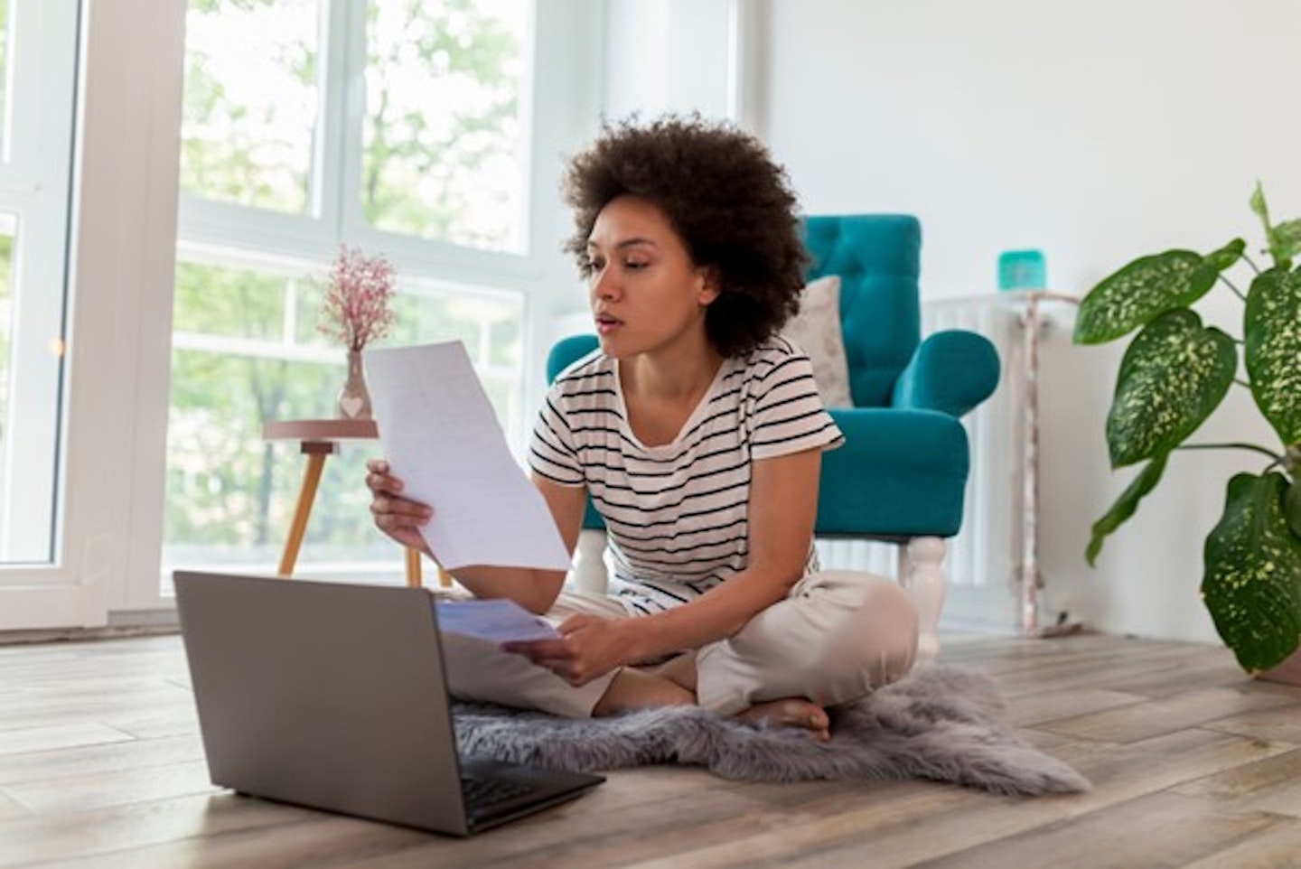 Woman looking at laptop