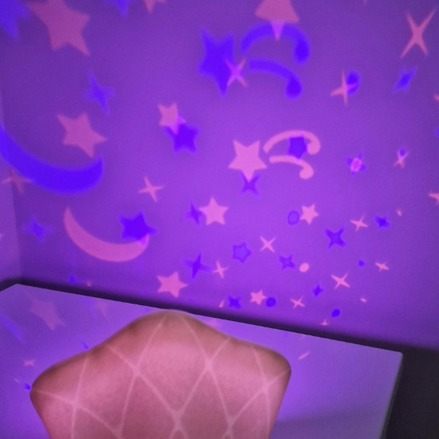 purple projector lights on the Tiny Love Tiny Dreamer