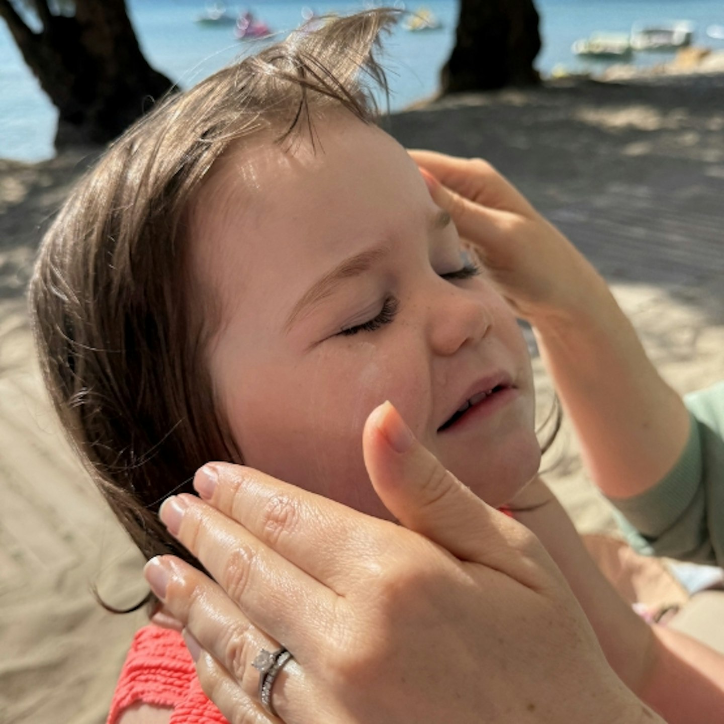 UltraSun Extreme SPF50+ Sun Cream being applied to young girl