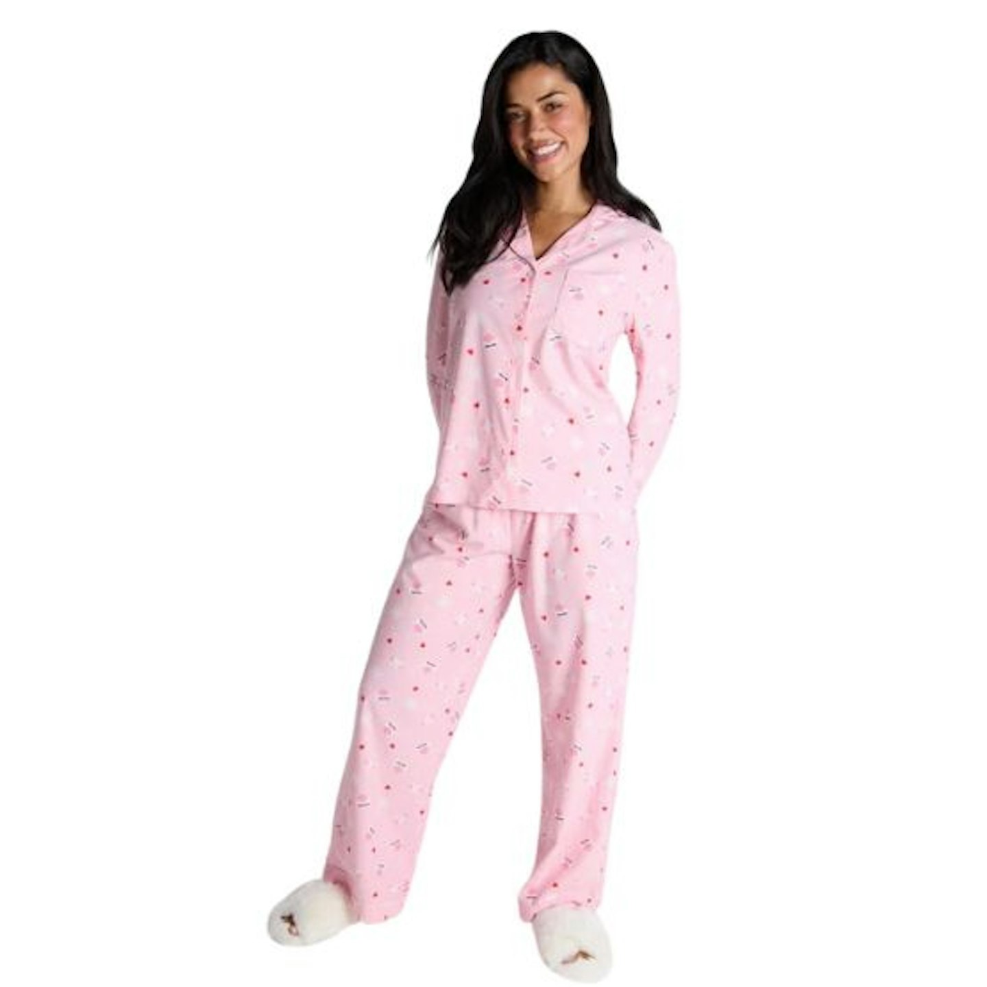 A woman wearing pink pyjamas 