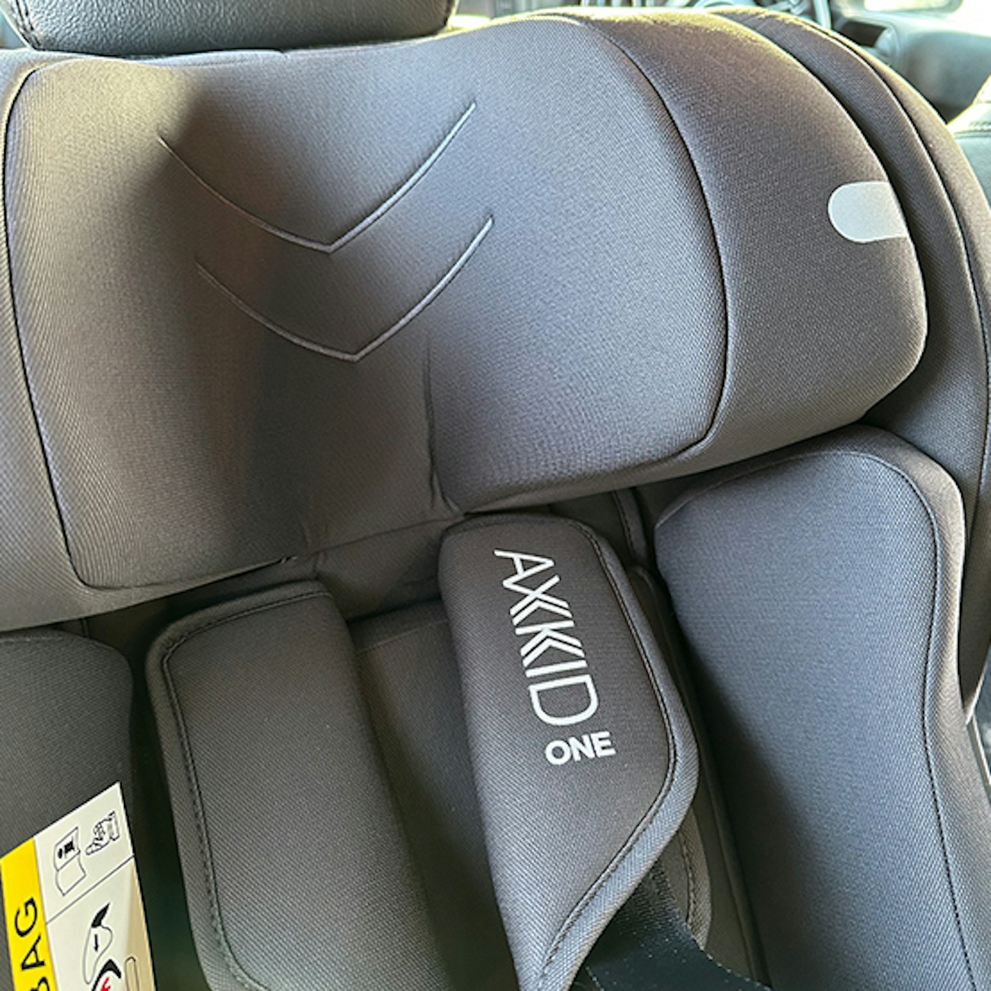 Close up of the headrest of the Axkid One 3 car seat