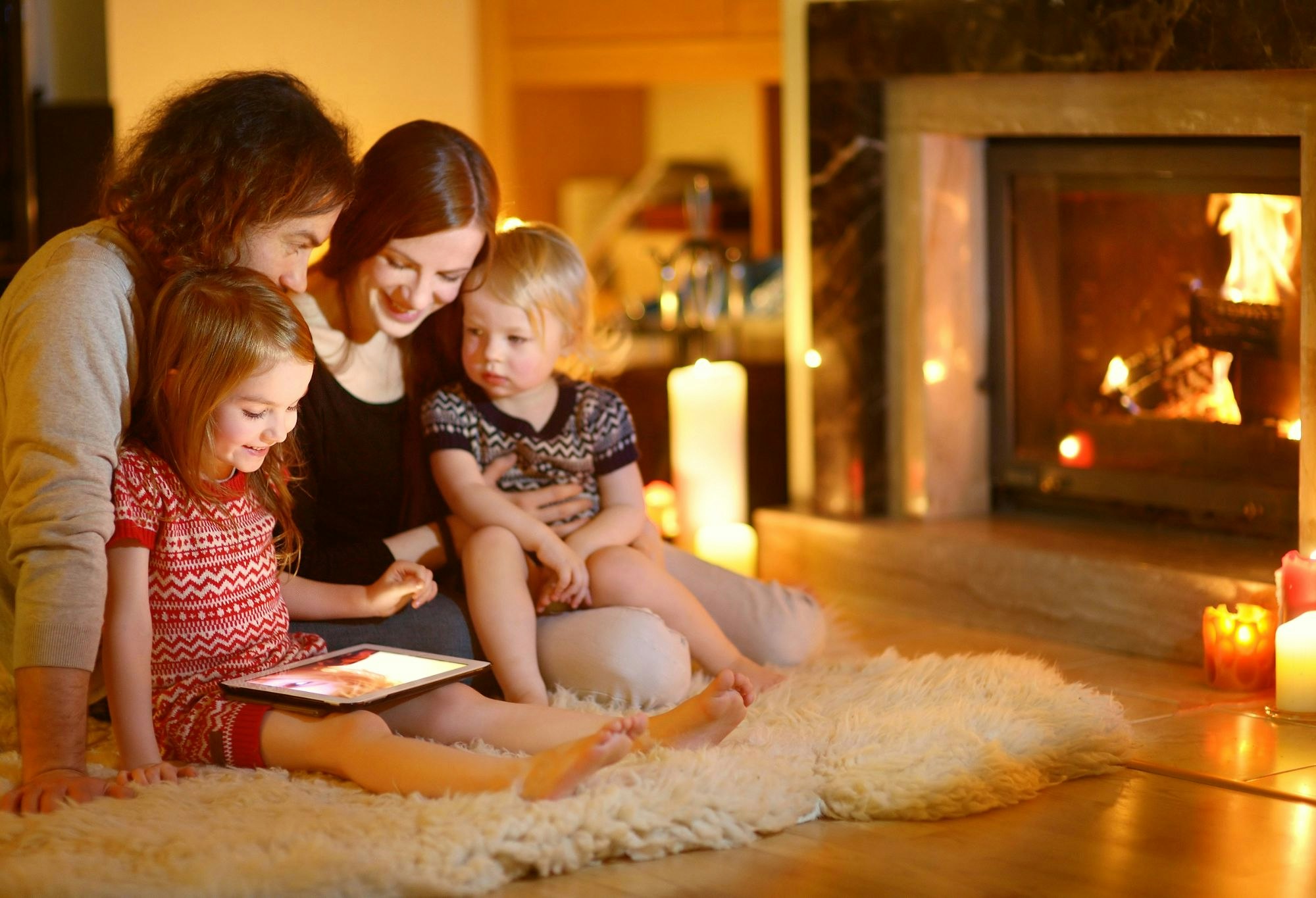 Family watching videos on an iPad