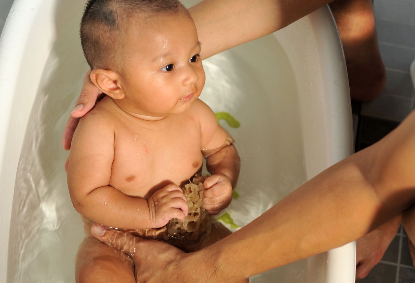 Father Bathing Baby