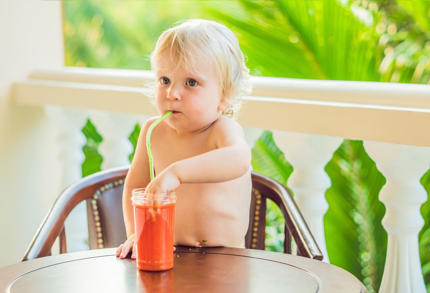 Happy Toddler Boy Drinking Healthy Selfmade Smoothie