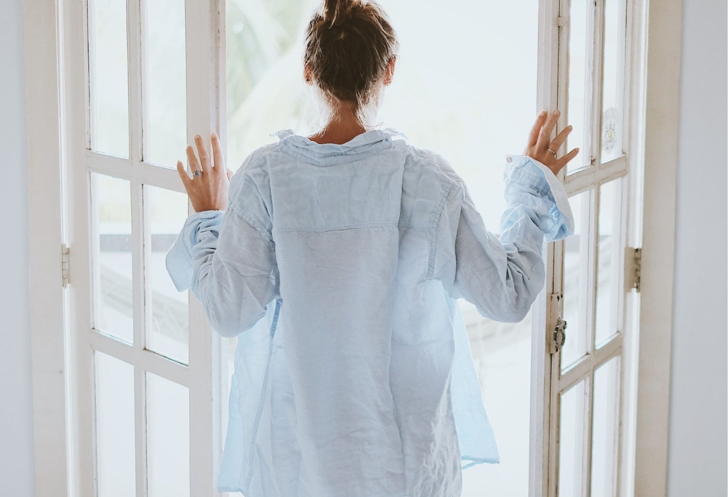 Woman in Morning Bedroom