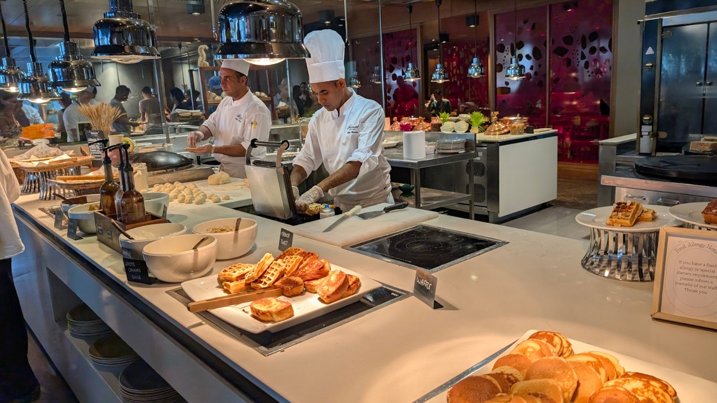 Chefs preparing fresh food at the Fairmont Bab Al Bahr.