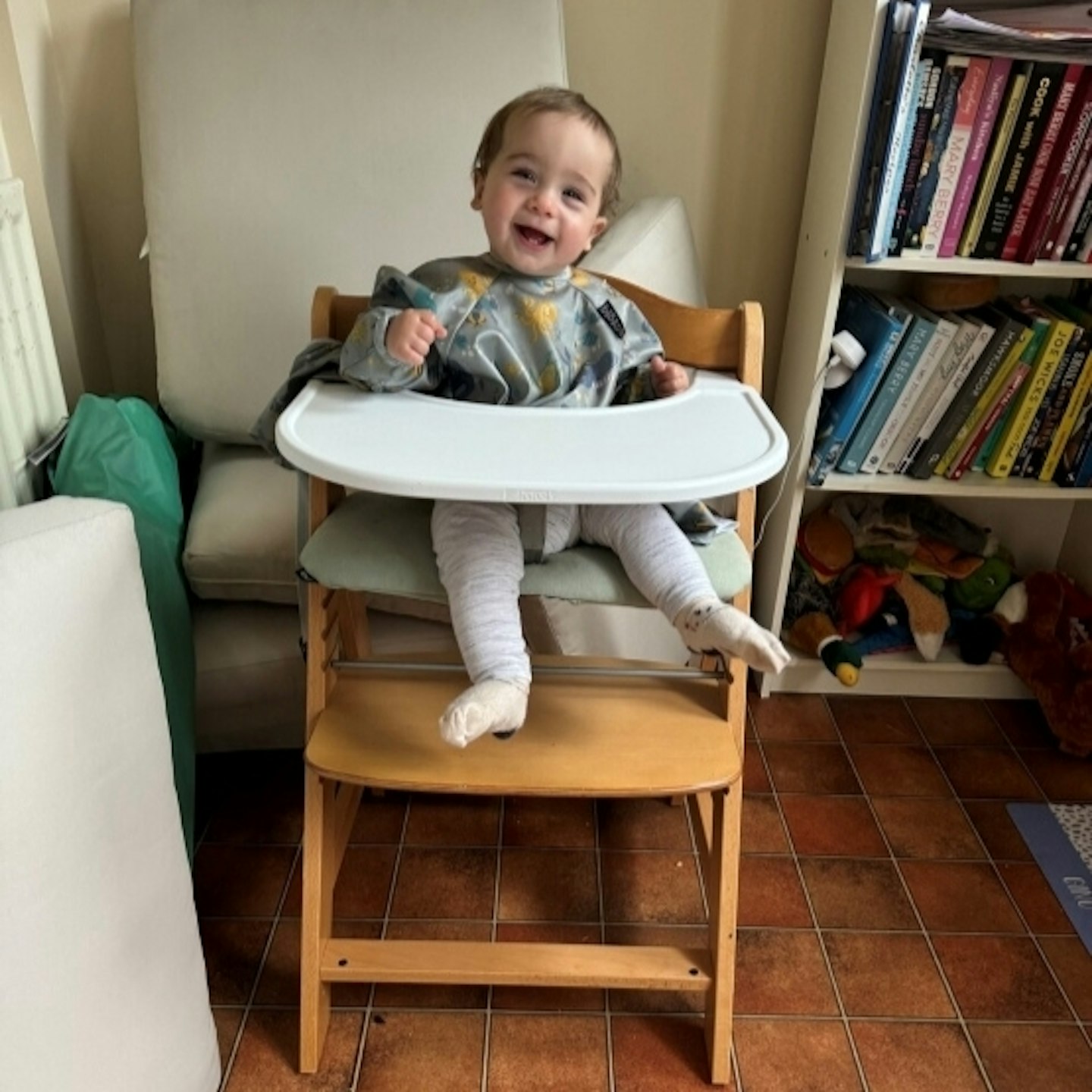 Toddler sitting in the Hauck Alpha+ highchiar