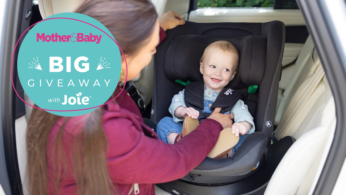 Woman and baby in Joie car seat