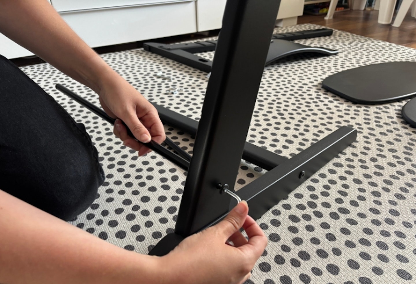 Cybex Iris 3-in-1 being assembled with Allen keys
