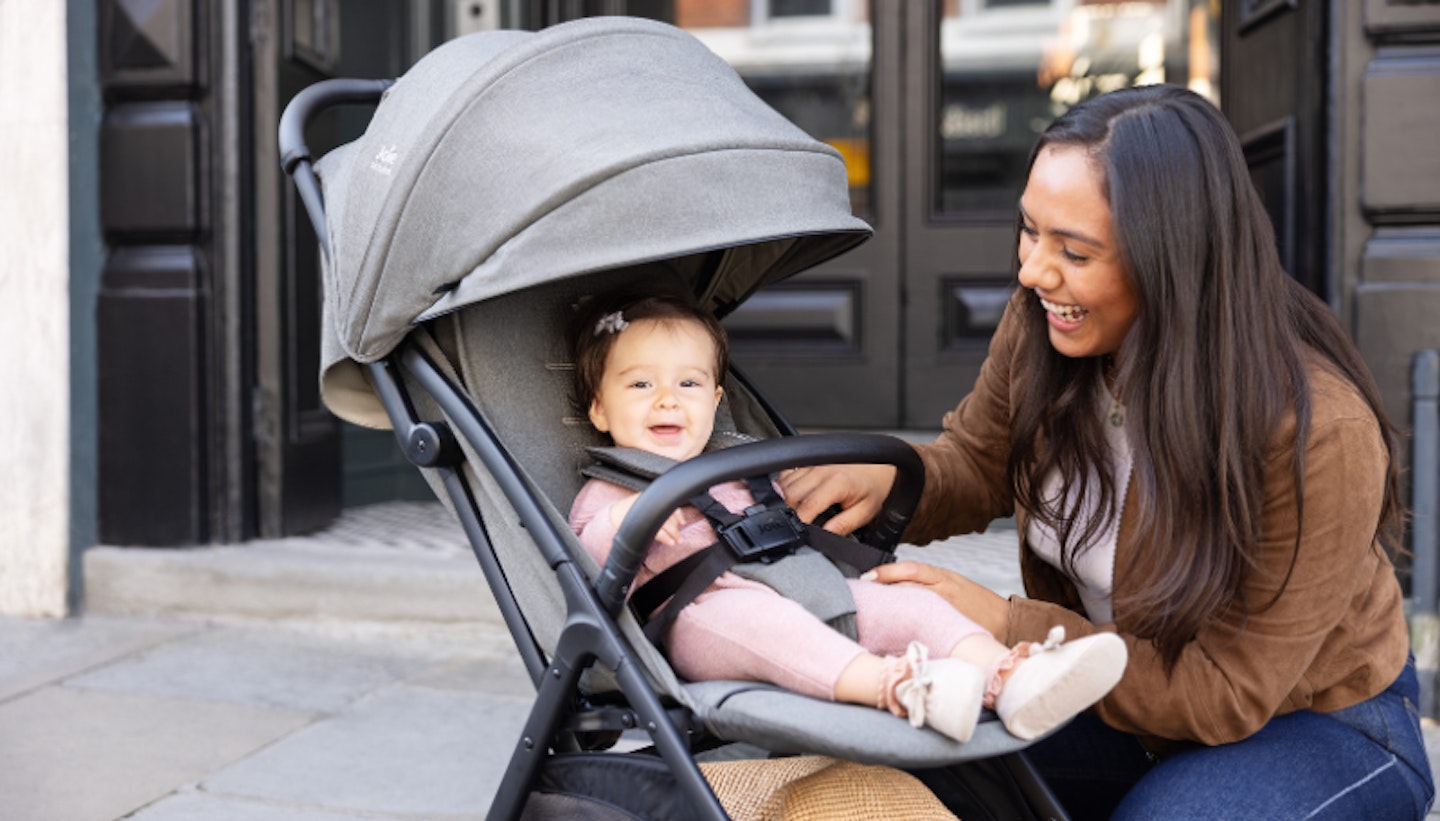 mum with baby in joie pushchair