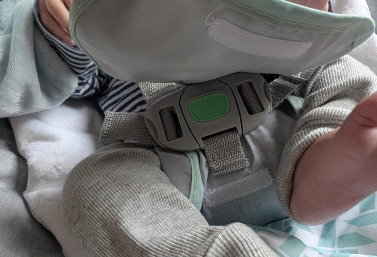 harness on the Ingenuity Keep Cozy 3-in-1 Grow with Me Bounce and Rock seat