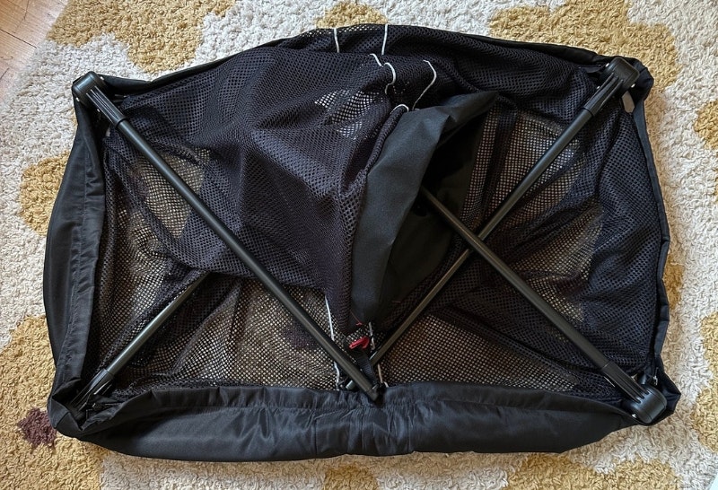 folded down BabyBjorn Travel Cot Light