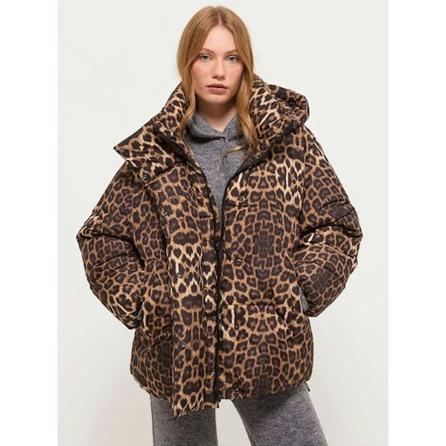 A blonde woman wearing an Asda George Leopard Print Coat