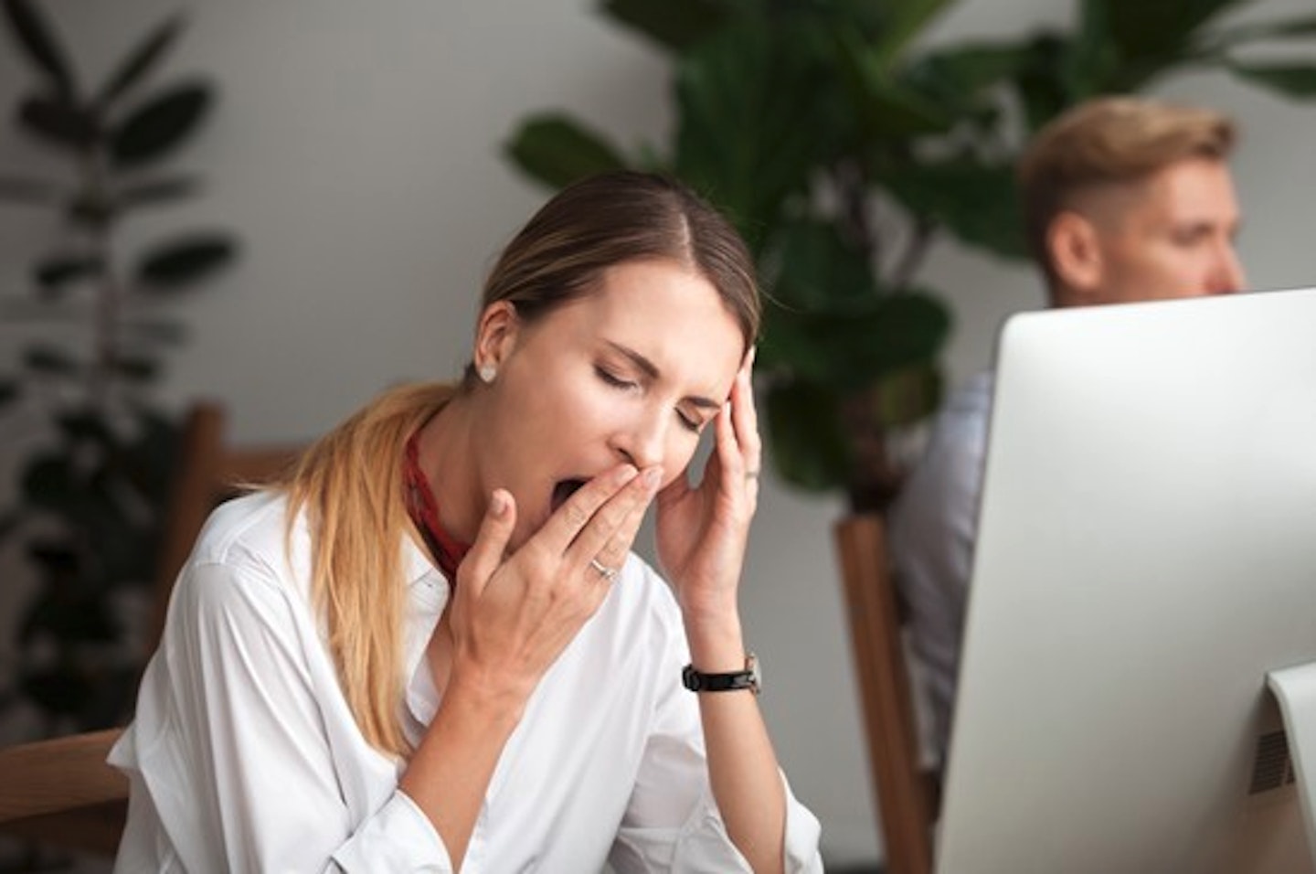 Woman yawning