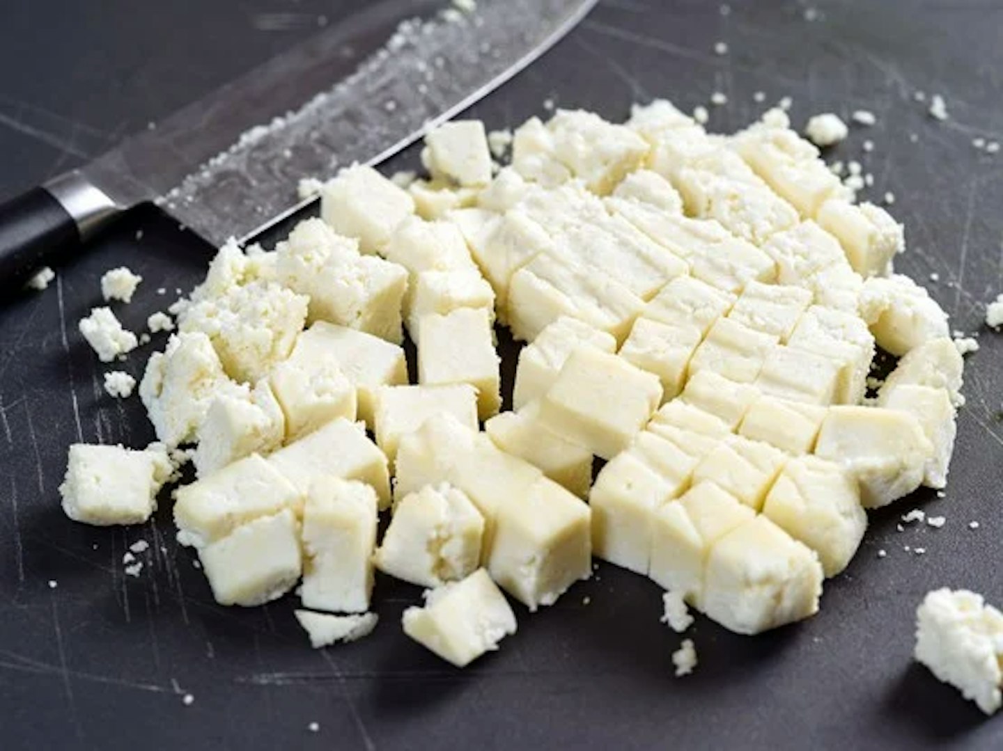 Paneer on a chopping board