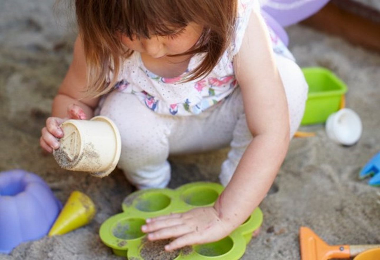 playing in sandpit