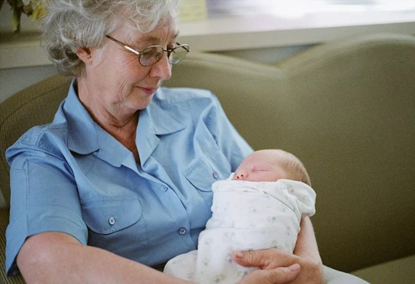 grandma holding baby